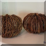 D099. 2 wood branch decorative pumpkins. 5”h - $10 for pair